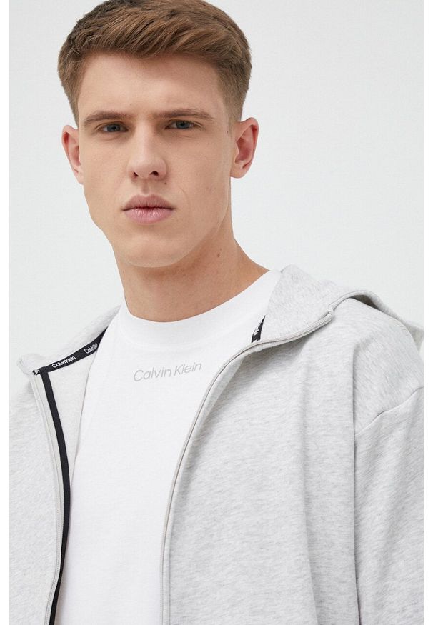 Calvin Klein Performance bluza treningowa Essentials kolor szary z kapturem melanżowa. Typ kołnierza: kaptur. Kolor: szary. Wzór: melanż