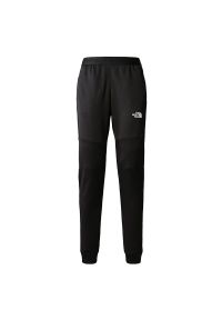 Spodnie The North Face Mountain Athletics Fleece 0A824RJK31 - czarne. Kolor: czarny. Materiał: tkanina, poliester, polar #1