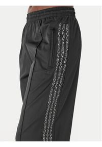 Adidas - adidas Spodnie dresowe Pearl Firebird KC7863 Czarny Loose Fit. Kolor: czarny. Materiał: syntetyk #3