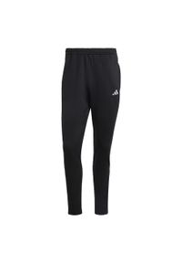 Adidas - Spodnie Own the Run Astro Knit. Kolor: czarny. Sport: bieganie