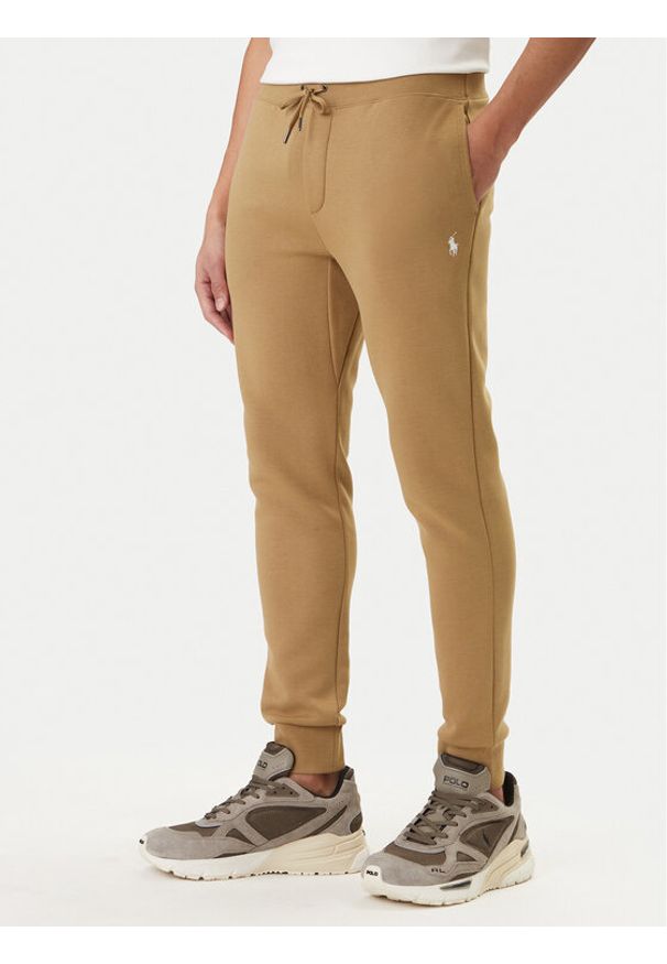Polo Ralph Lauren Spodnie dresowe 710881518502 Beżowy Regular Fit. Kolor: beżowy. Materiał: bawełna