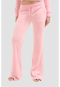 Juicy Couture - JUICY COUTURE Różowe damskie spodnie dresowe Layla Low Rise, Rozmiar M. Kolor: różowy. Materiał: dresówka