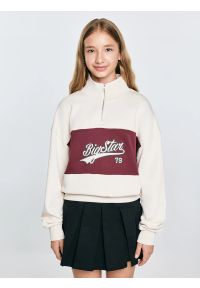 Big-Star - Bluza dziewczęca z krótkim zamkiem kremowa Rossalia 103. Okazja: na uczelnię, na spacer, na co dzień. Kolor: biały. Materiał: dresówka, dzianina. Długość: krótkie. Wzór: ze splotem, haft, aplikacja. Styl: casual
