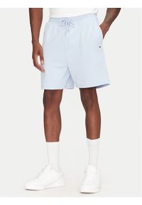 Tommy Jeans Szorty sportowe Entry GraphicDM0DM21369 Błękitny Regular Fit. Kolor: niebieski. Materiał: bawełna. Styl: sportowy