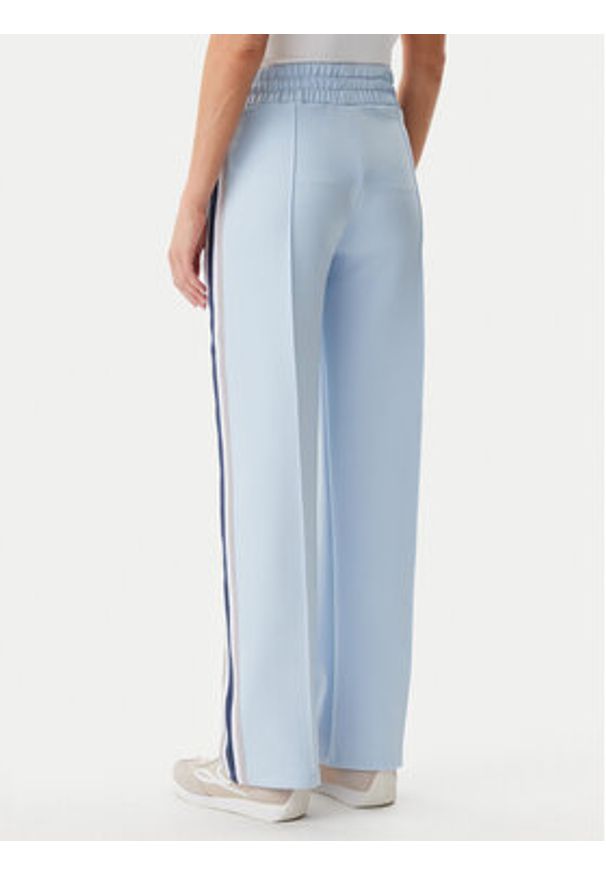 Guess Spodnie dresowe V5GB12 KCRU2 Błękitny Regular Fit. Kolor: niebieski. Materiał: syntetyk
