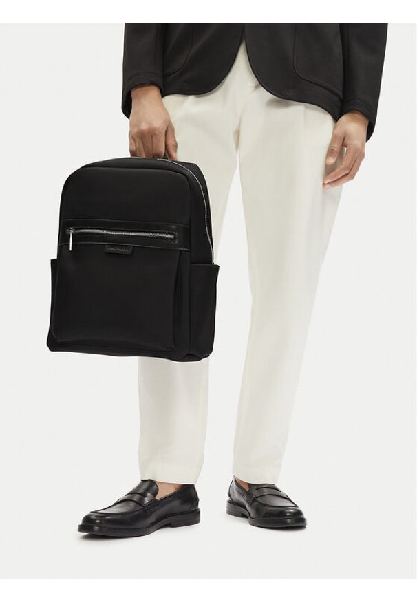 Gino Rossi Plecak 06A10939-2 Czarny. Kolor: czarny. Materiał: poliester