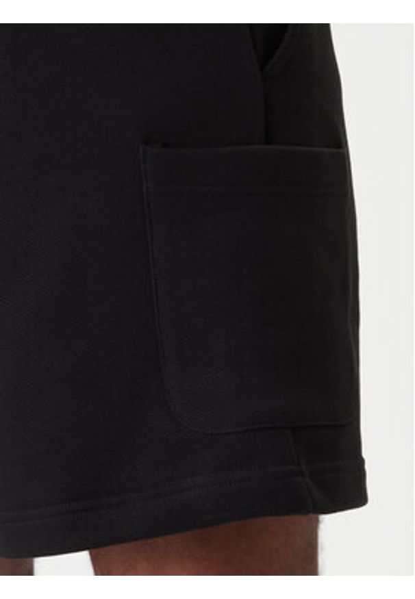 Tommy Jeans Szorty sportowe Badge DM0DM18479 Czarny Regular Fit. Kolor: czarny. Materiał: bawełna. Styl: sportowy