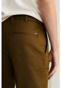 Mango Man - Spodnie Dublin. Kolor: brązowy. Materiał: tkanina, bawełna, materiał, elastan. Wzór: gładki #7
