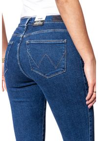 Wrangler - WRANGLER HIGH RISE SKINNY BLUE NOISE W27HFS047. Stan: podwyższony. Wzór: jednolity, aplikacja