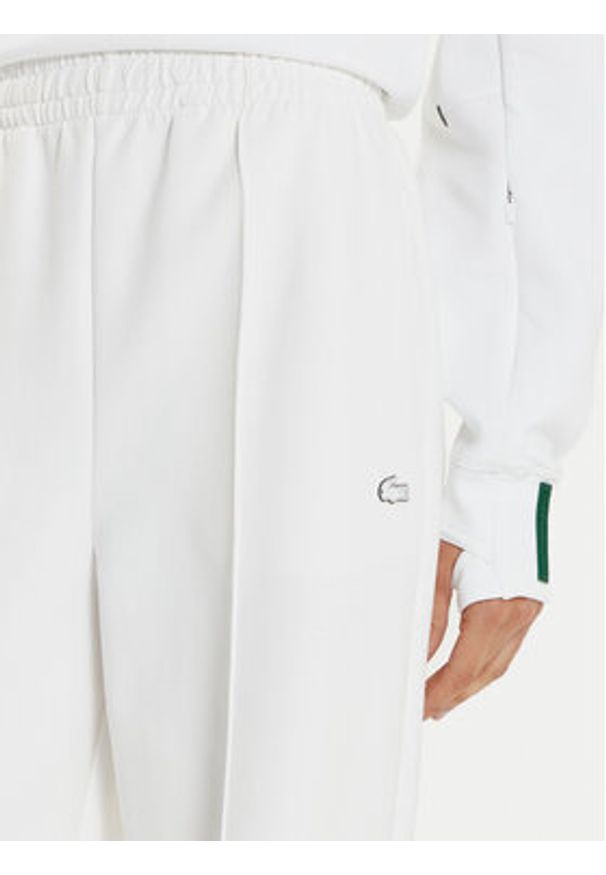 Lacoste Spodnie dresowe XF7374 Biały Wide Leg. Kolor: biały. Materiał: bawełna