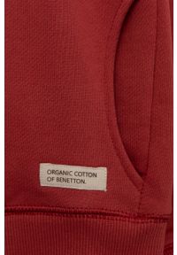 United Colors of Benetton bluza bawełniana dziecięca kolor bordowy z kapturem gładka. Okazja: na co dzień. Typ kołnierza: kaptur. Kolor: różowy. Materiał: bawełna. Wzór: gładki. Styl: casual #3