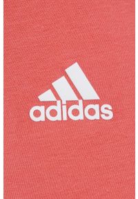 Adidas - adidas szorty HF1862 damskie kolor pomarańczowy z aplikacją high waist. Stan: podwyższony. Kolor: pomarańczowy. Materiał: bawełna, materiał, dzianina. Wzór: aplikacja #4