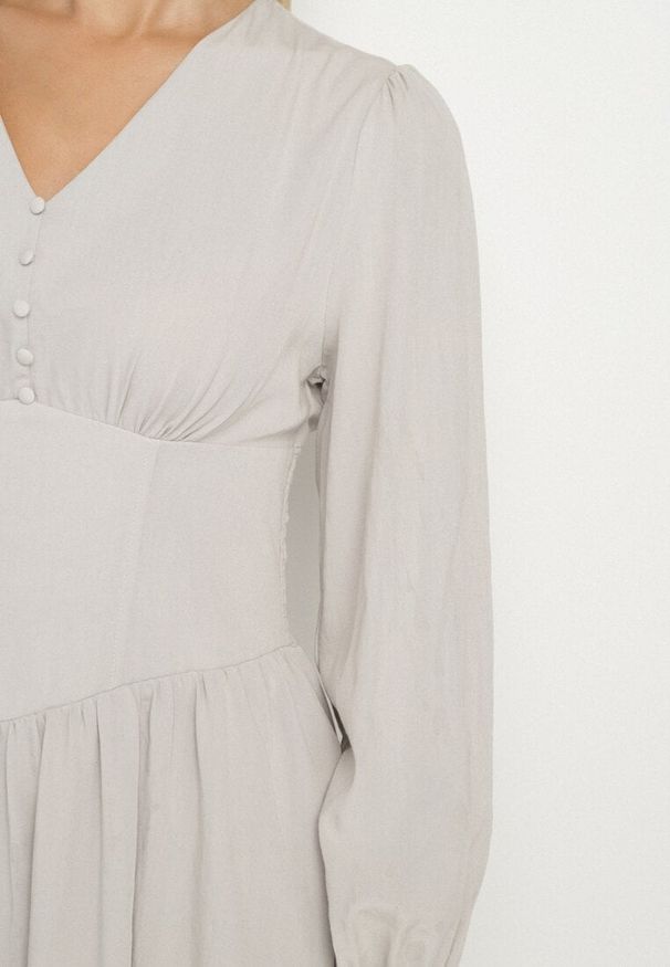 Born2be - Jasnobeżowa Sukienka z Wiskozą z Gorsetową Talią i Bufiastymi Rękawami Aniste. Okazja: na co dzień. Typ kołnierza: dekolt gorset. Kolor: beżowy. Materiał: wiskoza. Typ sukienki: gorsetowe. Styl: casual, elegancki, sportowy, wizytowy