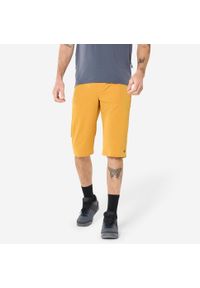 ROCKRIDER - Szorty rowerowe Rockrider unisex. Kolor: żółty, wielokolorowy, czarny, brązowy. Materiał: materiał, poliamid, poliester, elastan