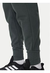 Adidas - adidas Spodnie dresowe Z.N.E. Winterized IR5244 Zielony Regular Fit. Kolor: zielony. Materiał: syntetyk #5