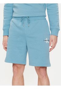 Calvin Klein Jeans Szorty sportowe Monologo J30J325131 Niebieski Regular Fit. Kolor: niebieski. Materiał: bawełna, syntetyk. Styl: sportowy