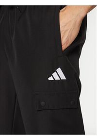 Adidas - adidas Dres Sportswear Woven Cargo JI8888 Czarny Regular Fit. Kolor: czarny. Materiał: syntetyk #3