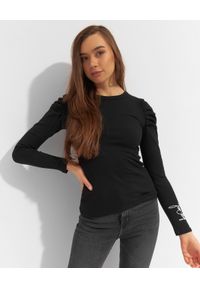 JOANNA MUZYK - Czarna bluzka z bufiastymi rękawami Buff. Kolor: czarny. Materiał: prążkowany, tkanina. Długość rękawa: długi rękaw. Długość: długie