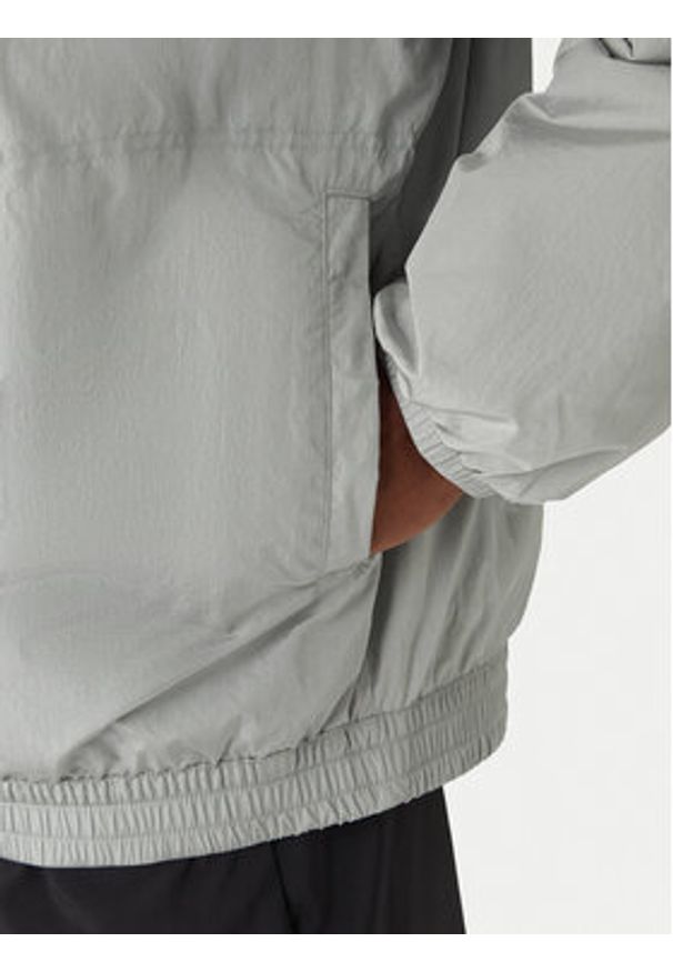 Adidas - adidas Kurtka przejściowa Moon Boot JM8923 Szary Loose Fit. Kolor: szary. Materiał: syntetyk