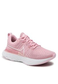 Buty Nike. Kolor: różowy. Materiał: materiał. Sport: bieganie #1