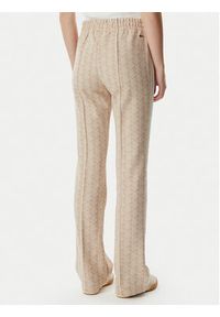 Lacoste Spodnie dresowe XF9313 Beżowy jasny Regular Fit. Kolor: beżowy. Materiał: syntetyk #2