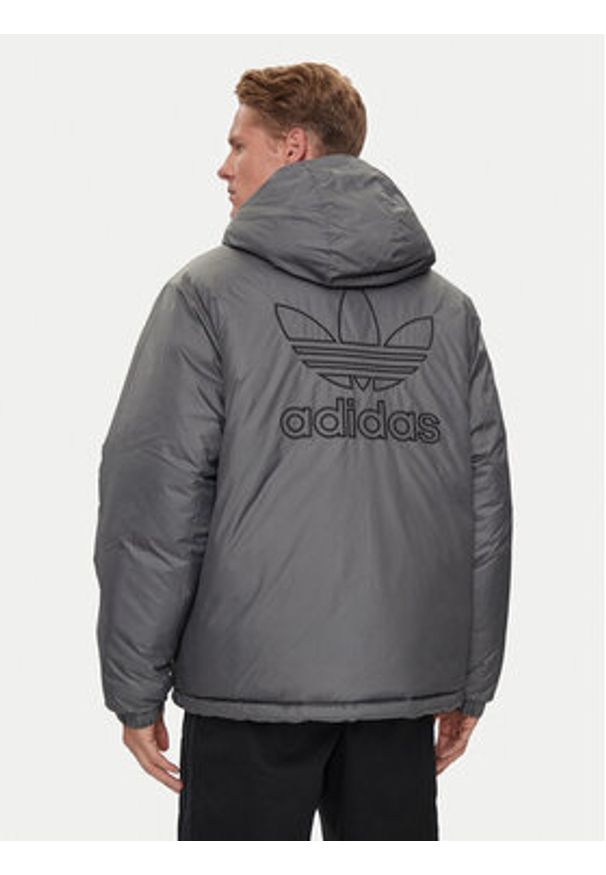 Adidas - adidas Kurtka zimowa adicolor JD9071 Czarny Regular Fit. Kolor: czarny. Materiał: syntetyk. Sezon: zima