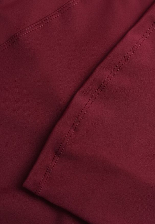 Renee - Bordowe Legginsy Dzwony High Waist Orruvana. Okazja: na spacer. Stan: podwyższony. Kolor: czerwony. Długość: krótkie. Styl: sportowy