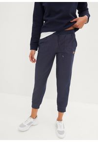 bonprix - Spodnie dresowe 7/8 w optyce dżinsowych. Kolor: niebieski #1