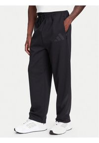 Adidas - adidas Spodnie dresowe Z.N.E. JC5478 Czarny Loose Fit. Kolor: czarny. Materiał: bawełna #1