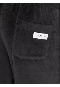 TOMMY HILFIGER - Tommy Hilfiger Spodnie dresowe UM0UM03014 Czarny Regular Fit. Kolor: czarny. Materiał: bawełna #3