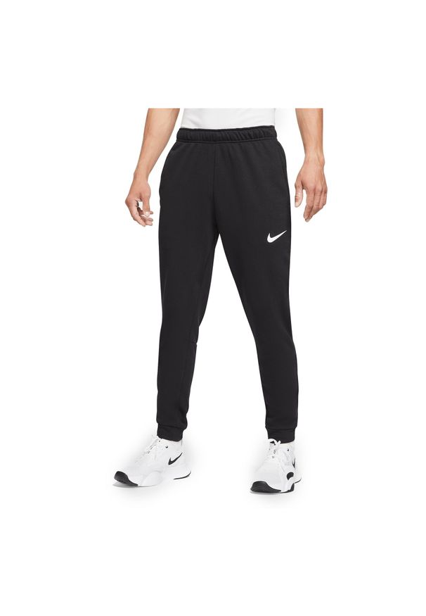 Spodnie treningowe męskie Nike Dri-Fit CZ6379. Materiał: materiał, włókno, dzianina, skóra, bawełna, syntetyk, poliester. Technologia: Dri-Fit (Nike). Sport: fitness