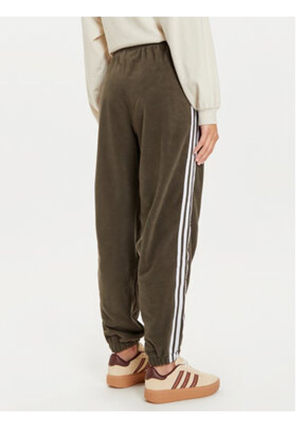 Adidas - adidas Spodnie dresowe adicolor Polar IY7835 Khaki Loose Fit. Kolor: brązowy. Materiał: syntetyk