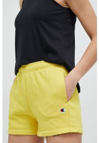 Champion szorty damskie kolor żółty gładkie high waist. Stan: podwyższony. Kolor: żółty. Materiał: materiał, dzianina. Wzór: gładki #1