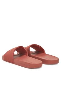 Calvin Klein Jeans Klapki Slide Monogram Cv YM0YM01271 Koralowy. Kolor: pomarańczowy. Materiał: materiał