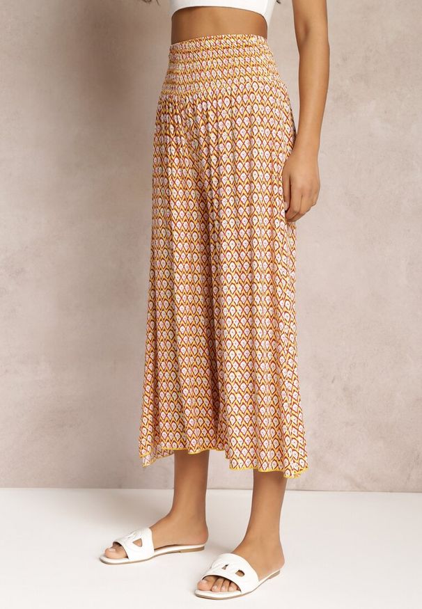 Renee - Żółto-Pomarańczowe Szerokie Spodnie z Wiskozy z Marszczoną Gumką w Talii Mellody. Kolor: żółty. Materiał: wiskoza. Styl: boho