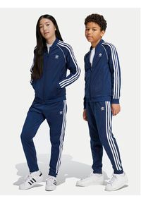 Adidas - adidas Spodnie dresowe adicolor SST IY7466 Granatowy Regular Fit. Kolor: niebieski. Materiał: syntetyk