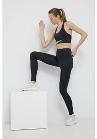 Reebok legginsy treningowe Workout Ready damskie kolor czarny gładkie. Kolor: czarny. Materiał: skóra. Wzór: gładki