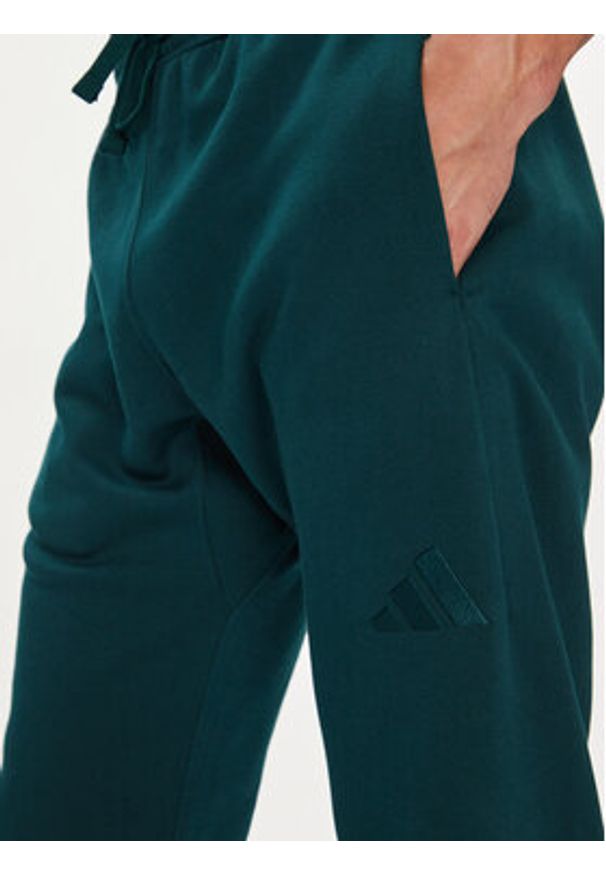 Adidas - adidas Spodnie dresowe ALL SZN Fleece JX5096 Zielony Tapered Leg. Kolor: zielony. Materiał: bawełna, syntetyk
