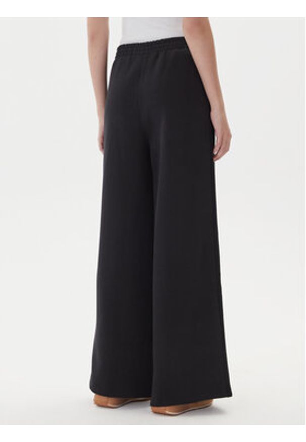 Adidas - adidas Spodnie dresowe adicolor Spacer 3-Stripes JV7500 Czarny Wide Leg. Kolor: czarny. Materiał: bawełna. Sport: turystyka piesza