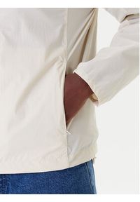 Tommy Jeans Wiatrówka DW0DW21188 Beżowy Regular Fit. Kolor: beżowy. Materiał: syntetyk