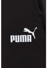Puma spodnie dresowe kolor czarny z nadrukiem. Kolor: czarny. Materiał: dresówka. Wzór: nadruk #5
