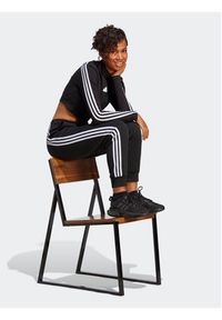 Adidas - adidas Spodnie dresowe Future Icons 3-Stripes Regular Tracksuit Bottoms HT4704 Czarny Regular Fit. Kolor: czarny. Materiał: bawełna #7