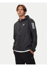Adidas - adidas Kurtka do biegania Own The Run IN1483 Czarny Slim Fit. Kolor: czarny. Materiał: syntetyk. Sport: bieganie