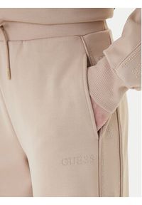 Guess Spodnie dresowe V5BB12 KCX22 Beżowy Regular Fit. Kolor: beżowy. Materiał: syntetyk #4