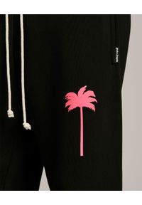 PALM ANGELS - Czarne spodnie z palmą. Kolor: czarny. Materiał: dresówka, bawełna. Wzór: aplikacja #4