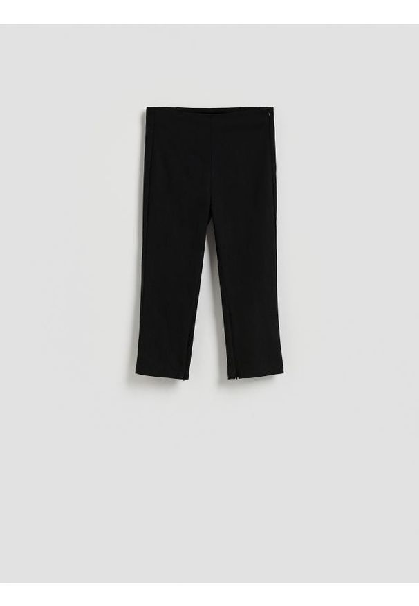 Reserved - Spodnie capri - czarny. Kolor: czarny. Materiał: dzianina, wiskoza