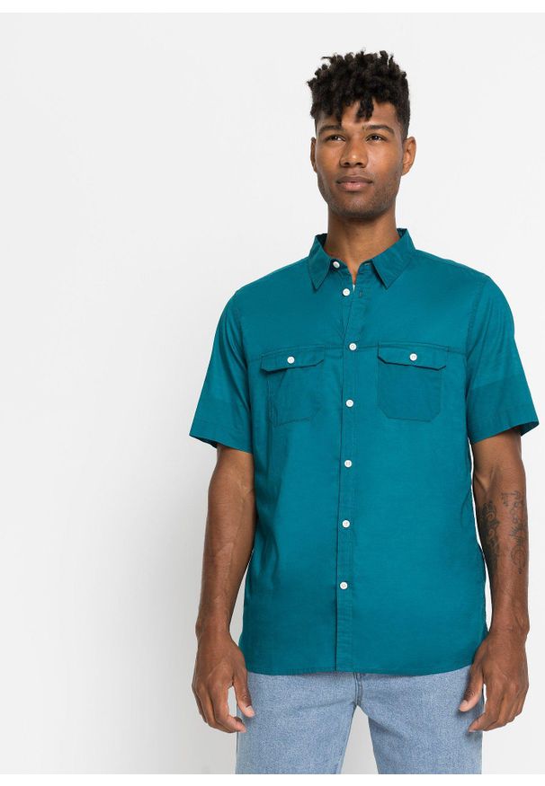 bonprix - Koszulka z krótkim rękawem, z czystej bawełny. Typ kołnierza: kołnierzyk włoski. Kolor: niebieski. Materiał: bawełna, materiał. Długość rękawa: krótki rękaw. Długość: krótkie. Sezon: lato