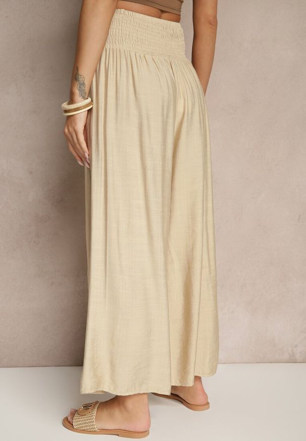 Renee - Beżowe Spodnie z Wiskozą o Szerokim Kroju High Waist Orrana. Okazja: na co dzień. Stan: podwyższony. Kolor: beżowy. Materiał: wiskoza. Styl: casual, elegancki