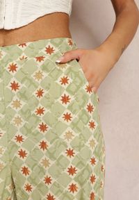 Renee - Jasnozielone Szerokie Spodnie w Fantazyjny Print Bawełniane Rosabella. Kolor: zielony. Materiał: bawełna. Wzór: nadruk. Sezon: lato #3