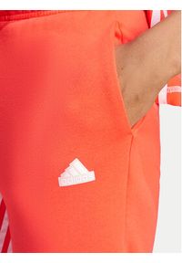 Adidas - adidas Spodnie dresowe Dance All-Gender Versatile IS0897 Pomarańczowy Regular Fit. Kolor: pomarańczowy. Materiał: bawełna #8